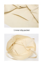 Cream unlined canvas tote bag with inner slip pocket