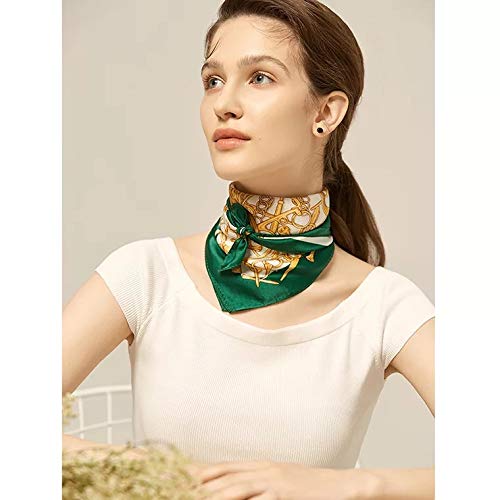 Model turned to the side, the green-bordered equestrian square knotted under her chin