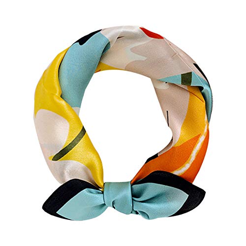 Aqua portrait square coiled into a ring and tied in a bow, black border on the tails