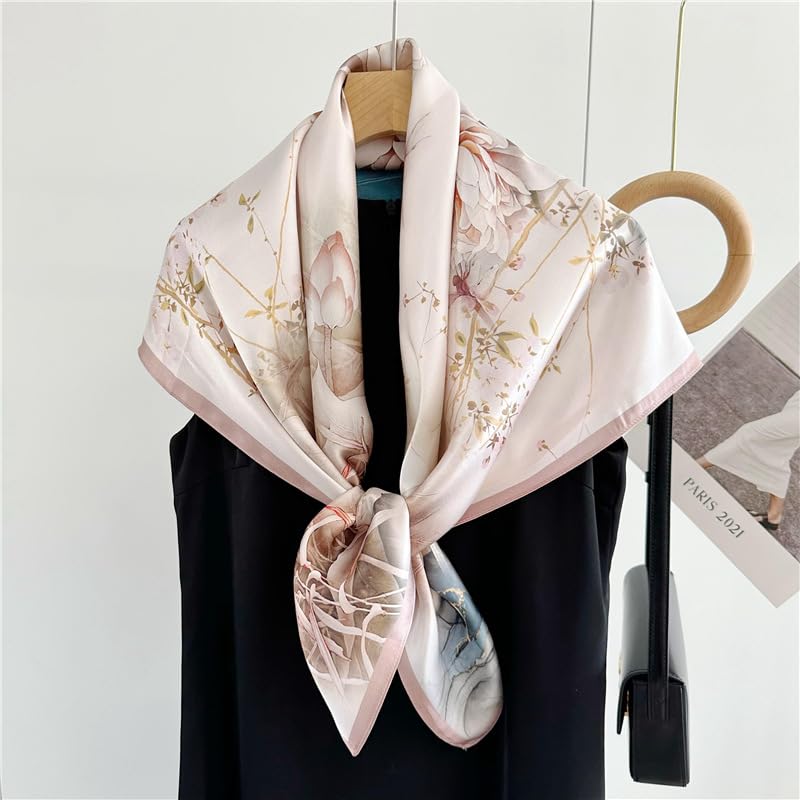 The ink wash silk scarf tied at the neck of a display form