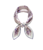 Mauve iris-print square knotted into a small loop, white border and violet edge line
