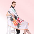 Model with the white ink print silk scarf draped across both shoulders