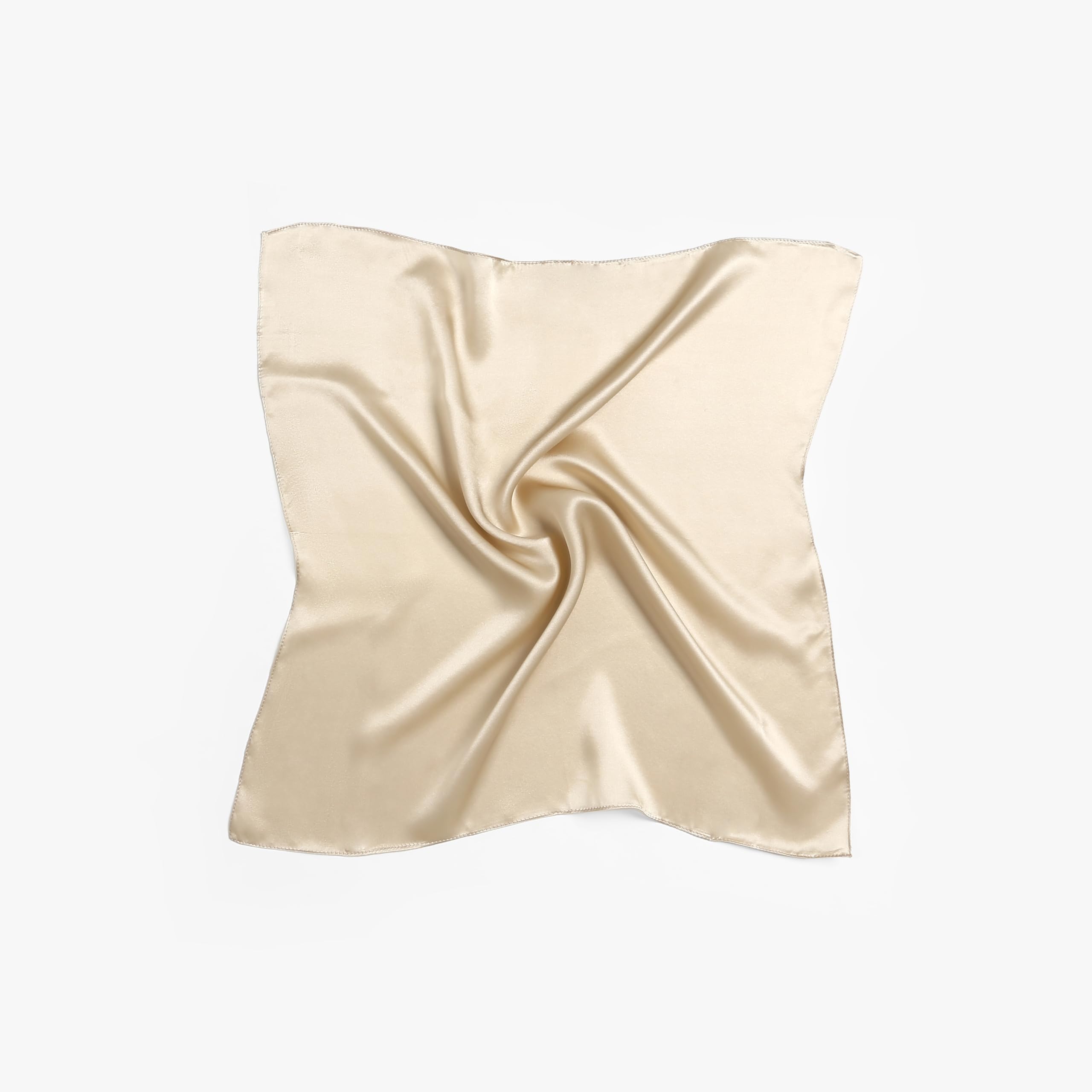 Champagne beige silk square laid flat with a pinwheel swirl gathered at the centre