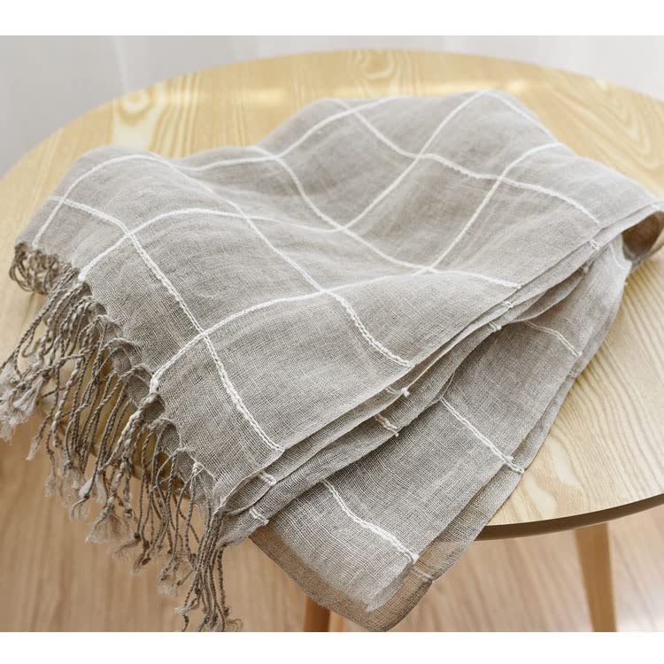 Plaid linen scarf folded to show the scale of the check against the full width