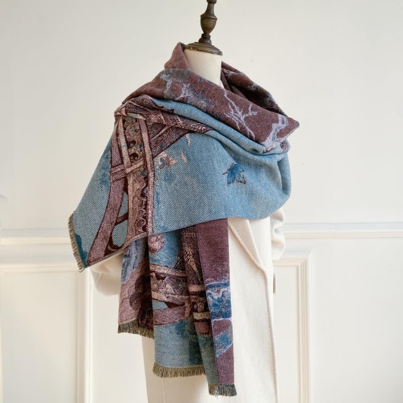 The Paris shawl wrapped over a dress form with the fringed ends hanging at the front