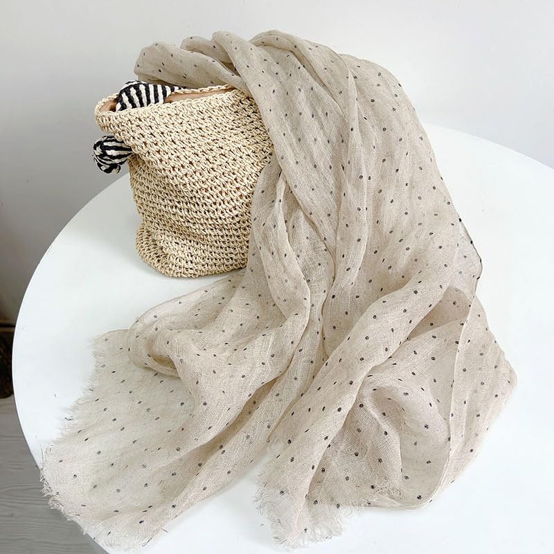 Polka dot linen scarf open across the shoulders