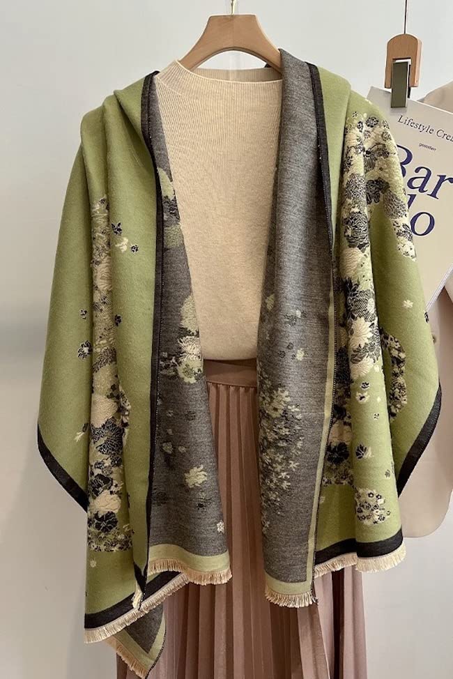 The shawl worn open over a dress form and a pleated skirt showing both printed panels hanging long