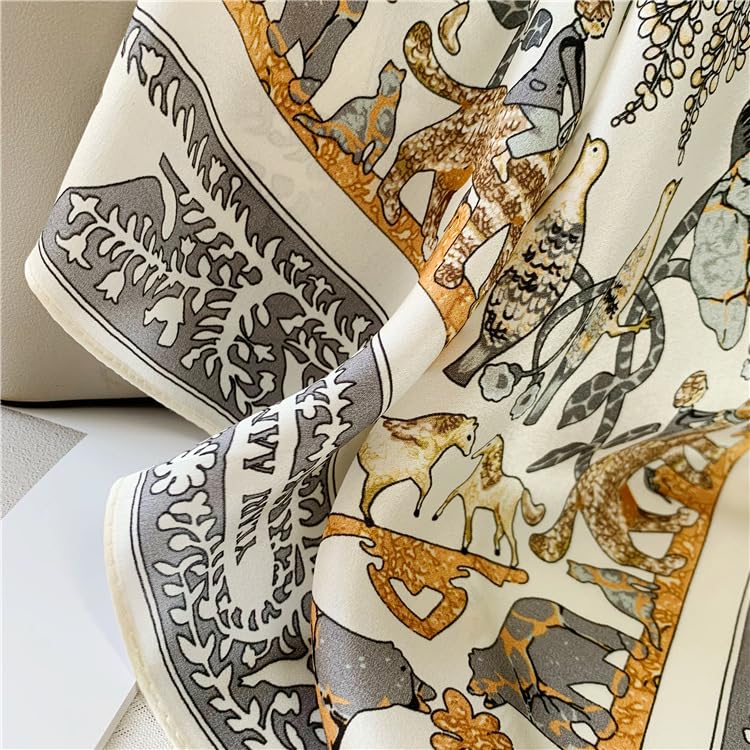 Cream silk folds with the grey scrollwork panel meeting the gold animal field