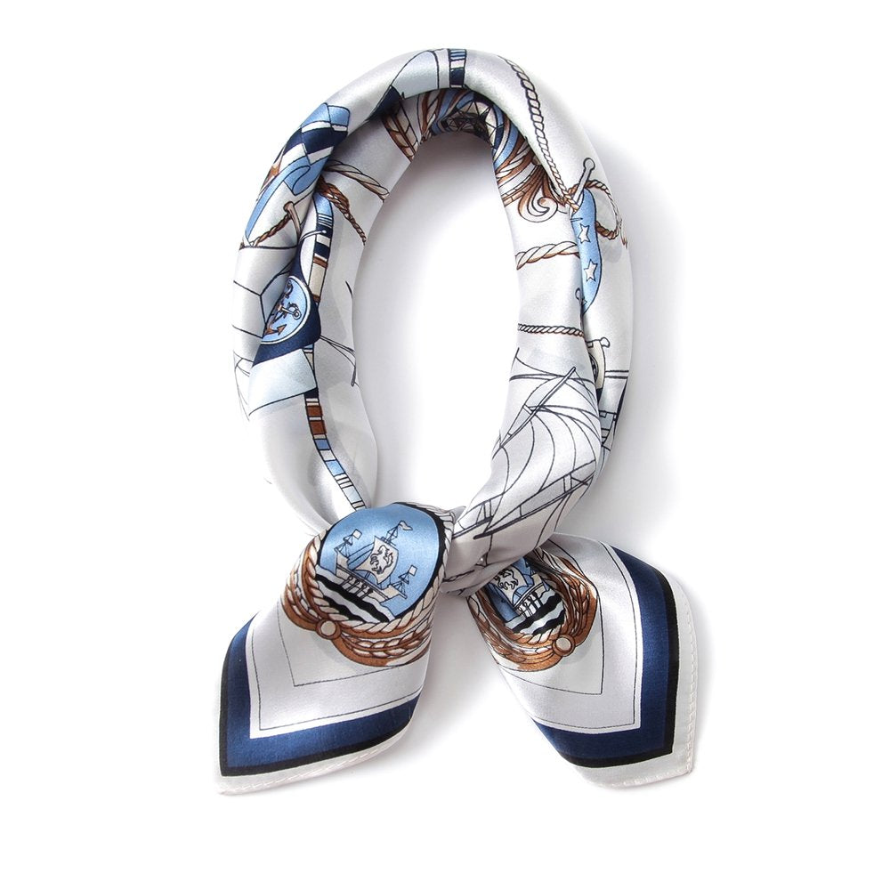 White nautical square coiled into a loop and knotted, navy border on the tails