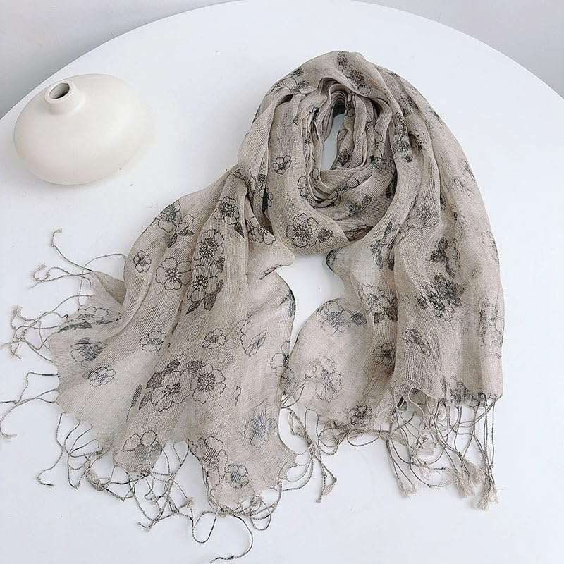Detail of the knotted fringe on the ink floral linen scarf