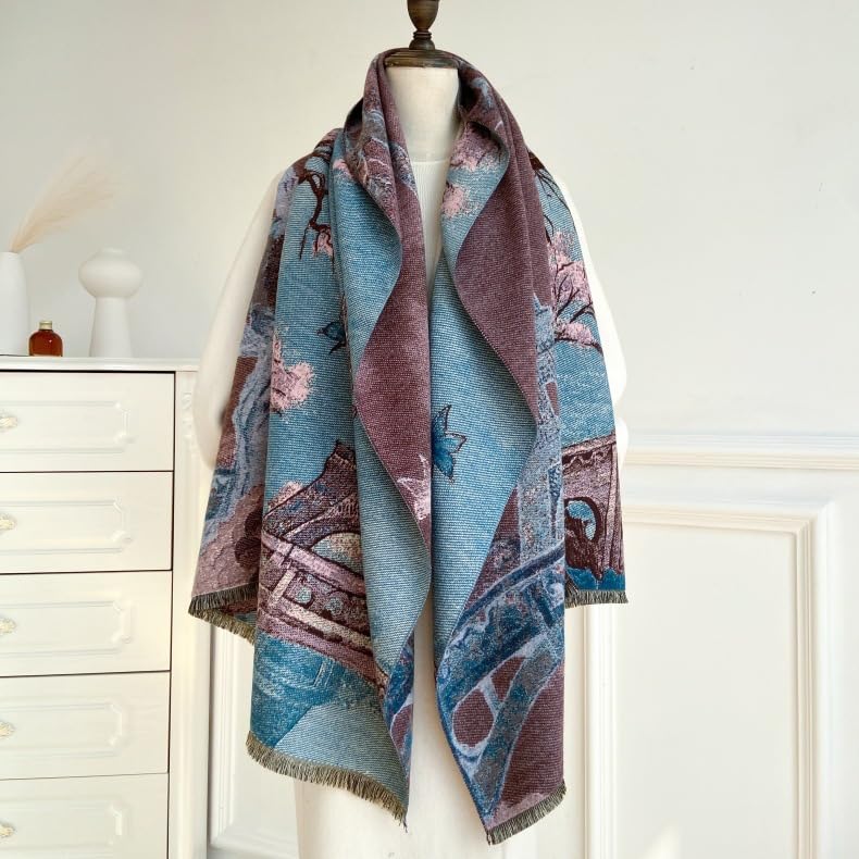 Paris blossom shawl hung open on a dress form beside a white chest of drawers