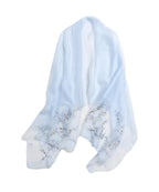 Pale blue semi sheer shawl with fine trailing vine embroidery and sequins across both ends