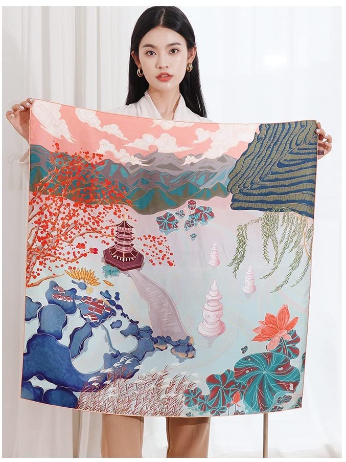 Model holding the two lakes silk scarf open to show the full landscape print