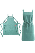 Mint green cotton twill apron shown from the back and the front with H shaped straps