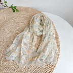 Yellow botanical linen scarf draped, showing the full six and a half foot length