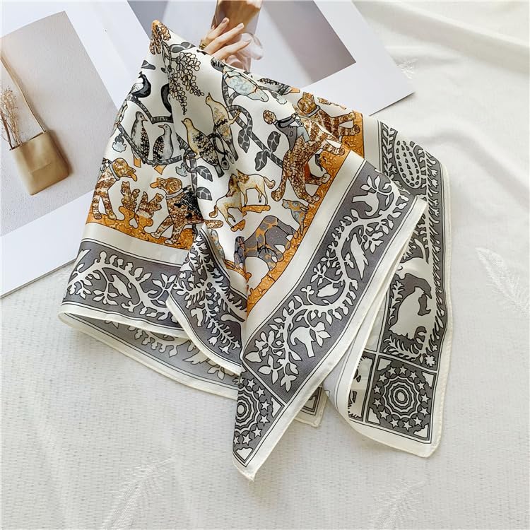 Cream square draped in folds, giraffes and big cats in gold beside the grey border