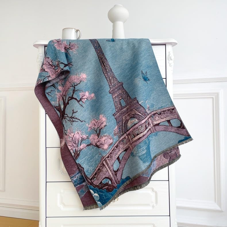 The shawl draped over a white cabinet showing the full tower and blossom branches