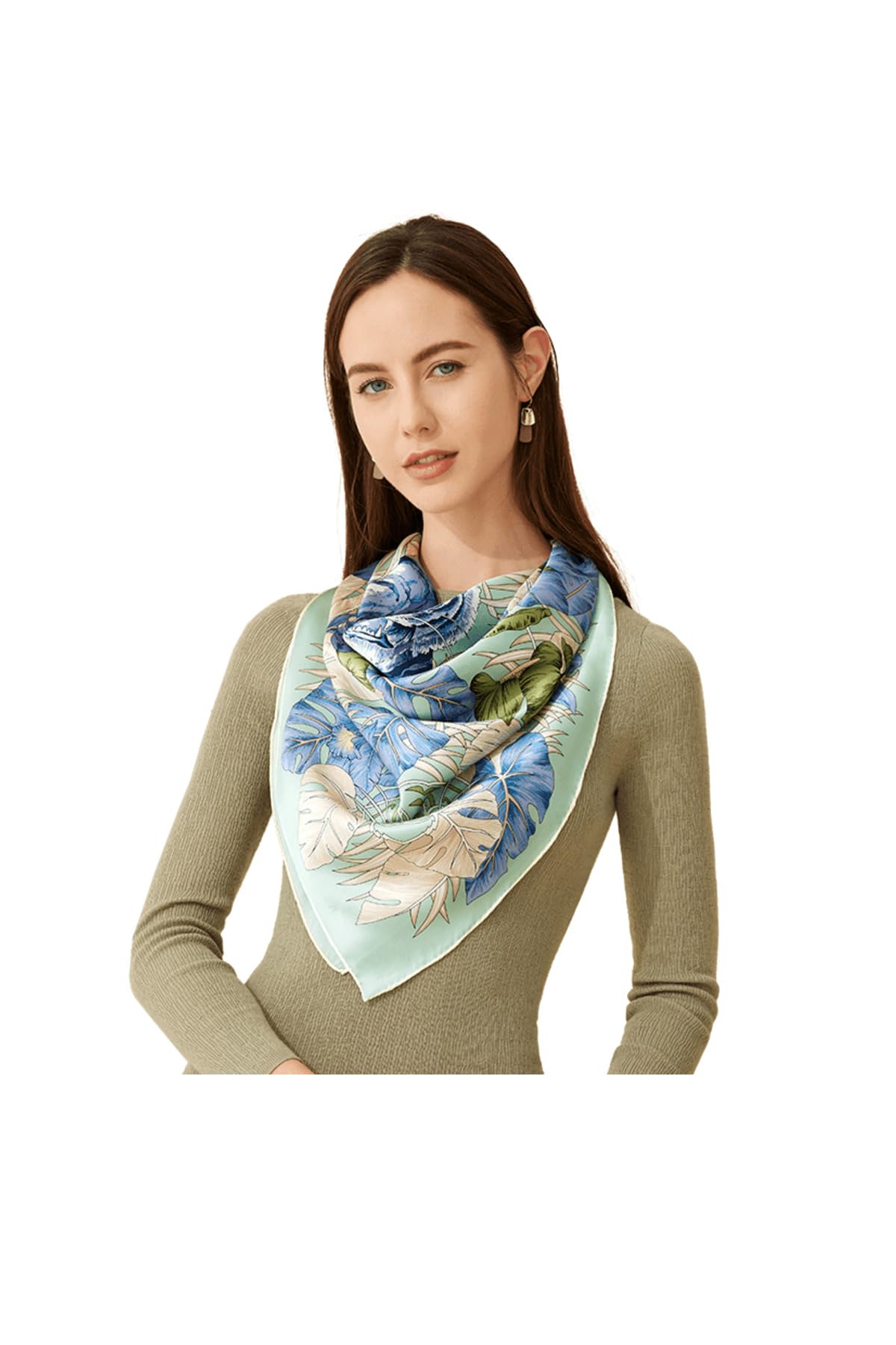 Cream silk scarf printed with blue hibiscus and green palm and monstera leaves inside a mint border