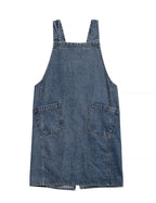 Mid blue denim apron laid flat showing two large patch pockets and the split hem