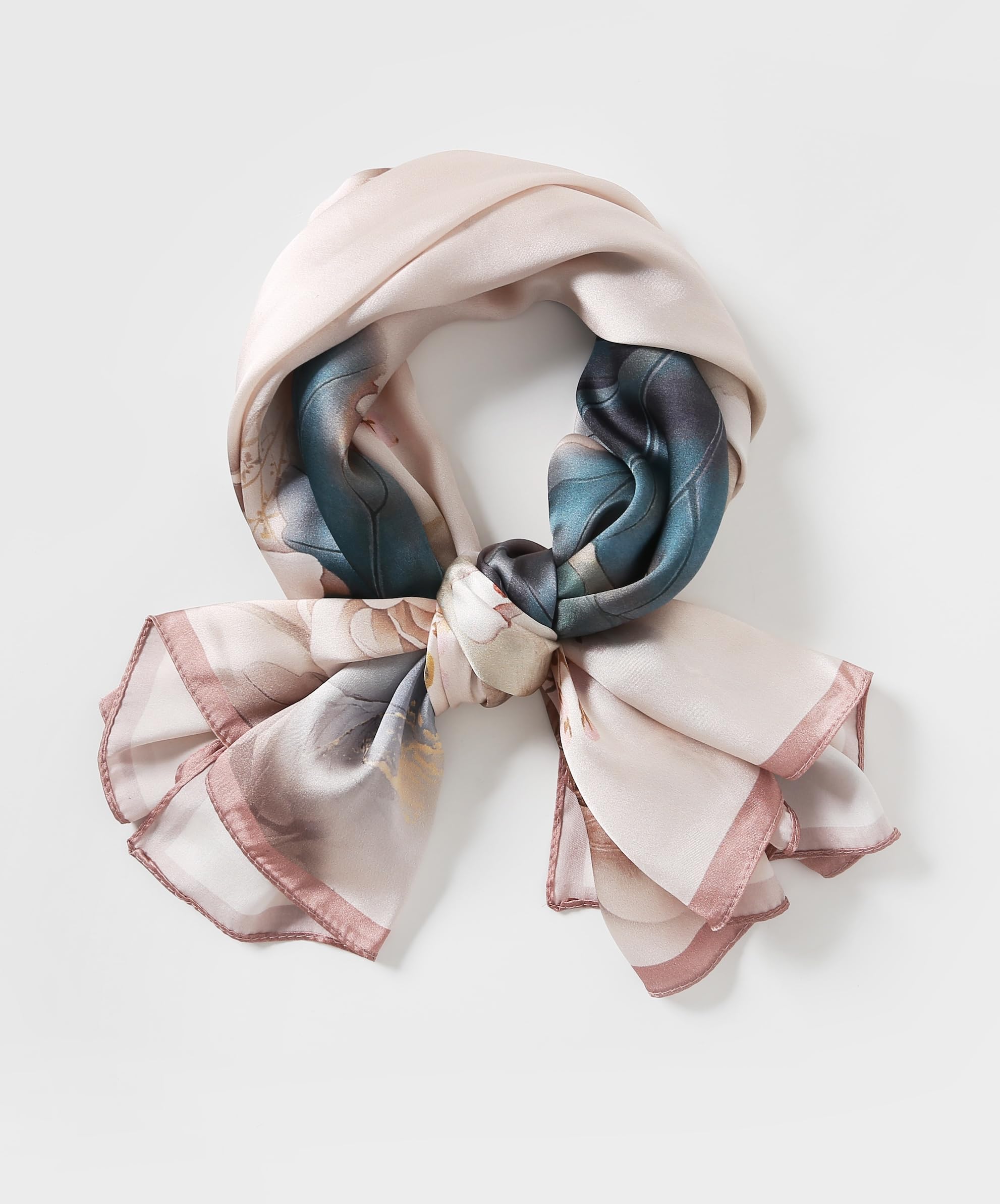 The ink lotus silk scarf rolled and tied into a ring