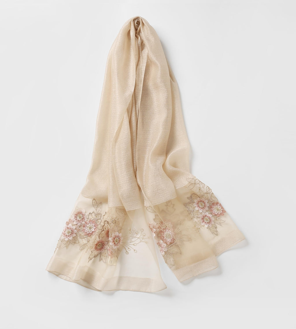 Champagne shawl draped showing the pink beaded floral bouquet