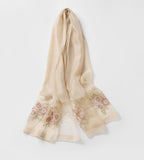 Champagne shawl draped showing the pink beaded floral bouquet