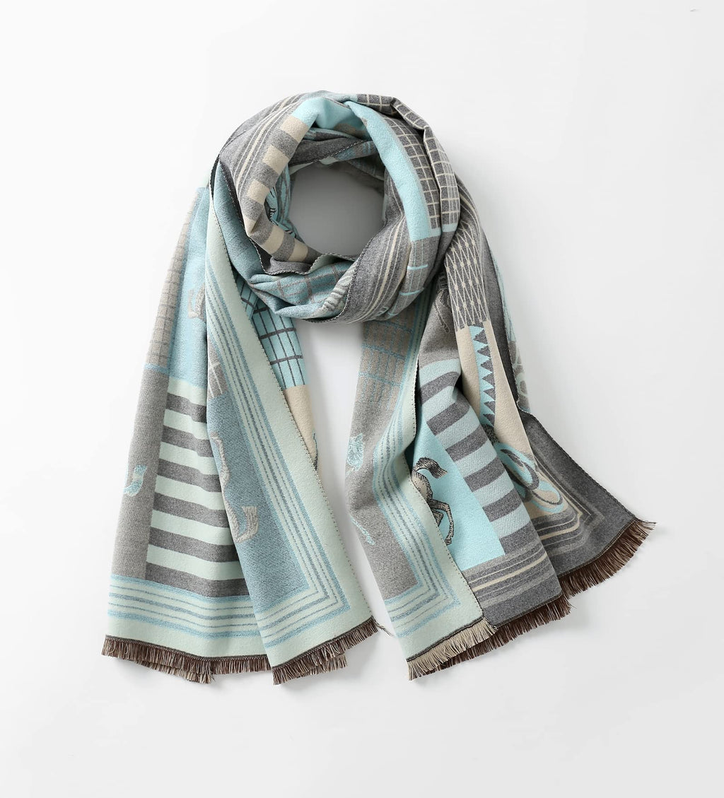 Pale blue horse print shawl looped once at the neck with both fringed ends hanging