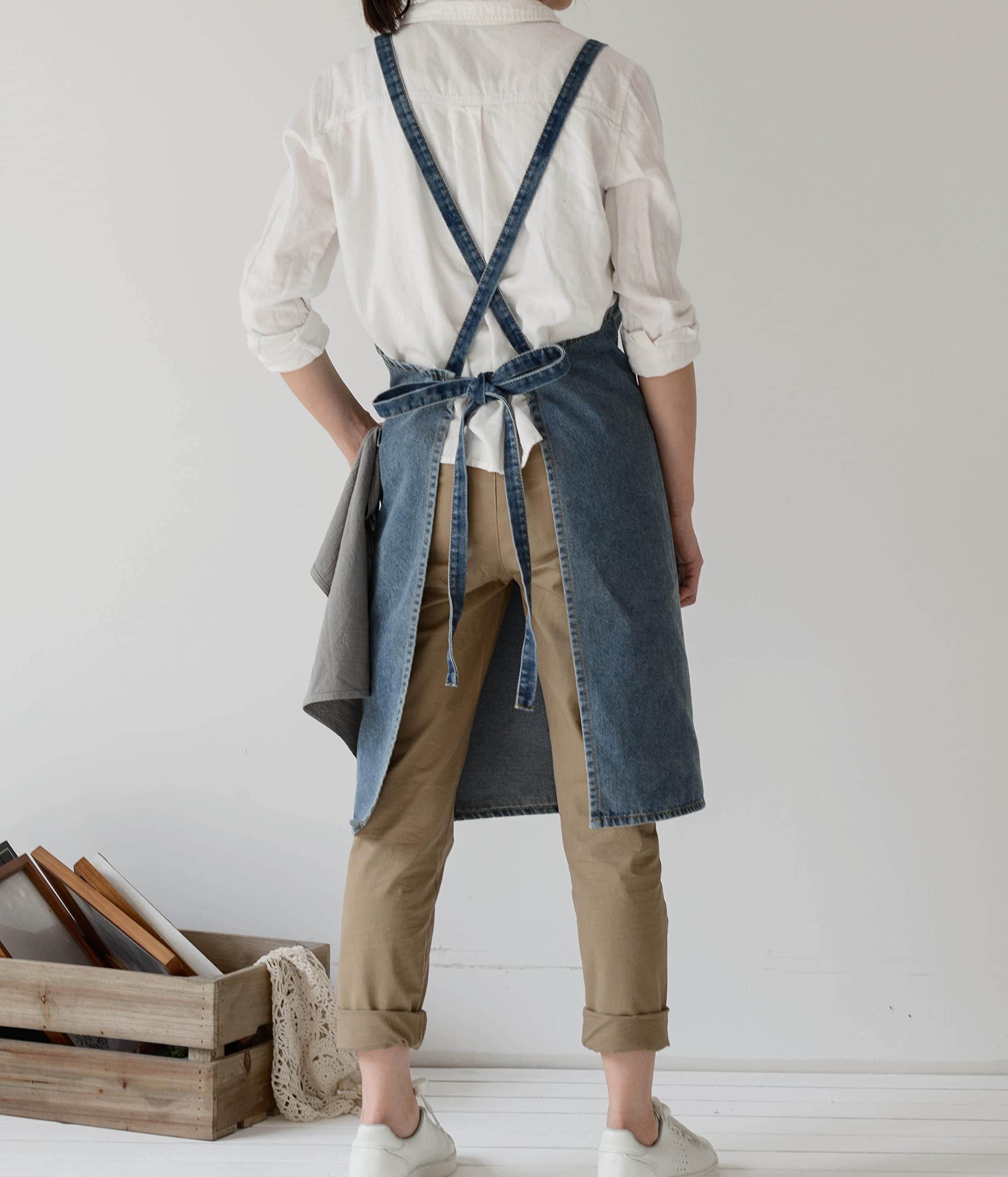 Back view showing the two long denim straps crossed behind the shoulders