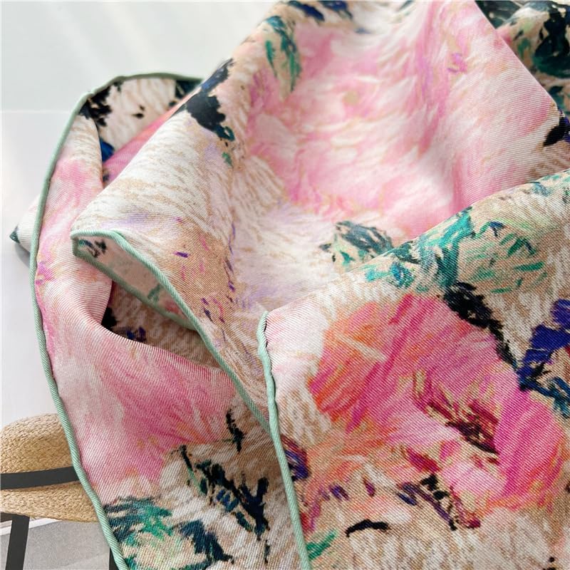 Close up of the blush pink roses and teal leaves painted on silk