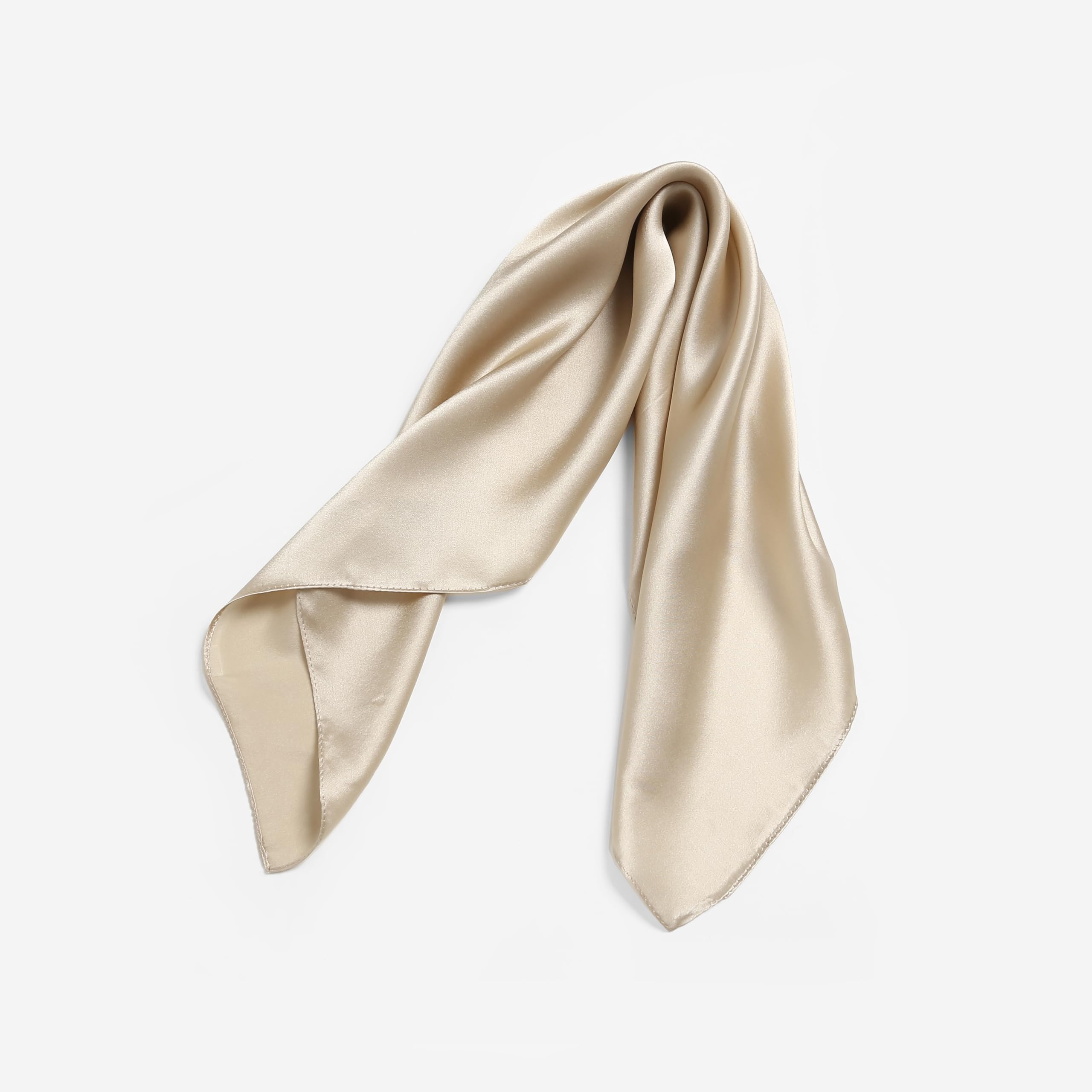 Champagne beige silk square gathered into a loose loop with the corners pointing down