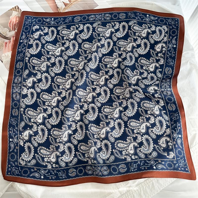 The whole navy square flat, cream and pale blue paisley inside a wide rust border