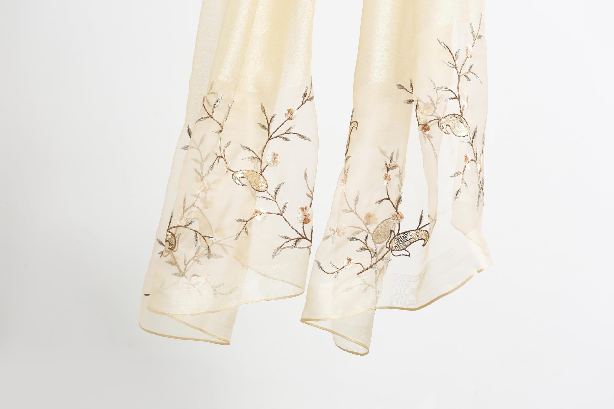 Both embroidered ends held up showing the vine and small blossoms