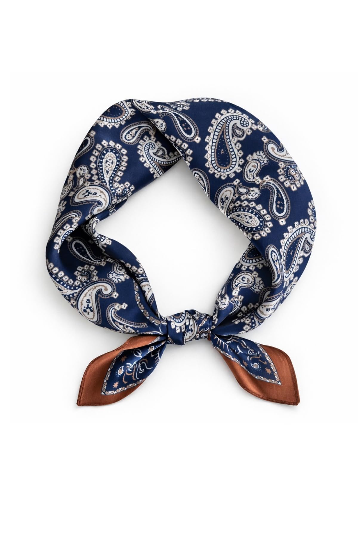 Navy paisley silk square knotted into a loop, rust border tails pointing down