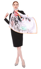 Model holding open a white silk scarf with black ink brushwork flowers