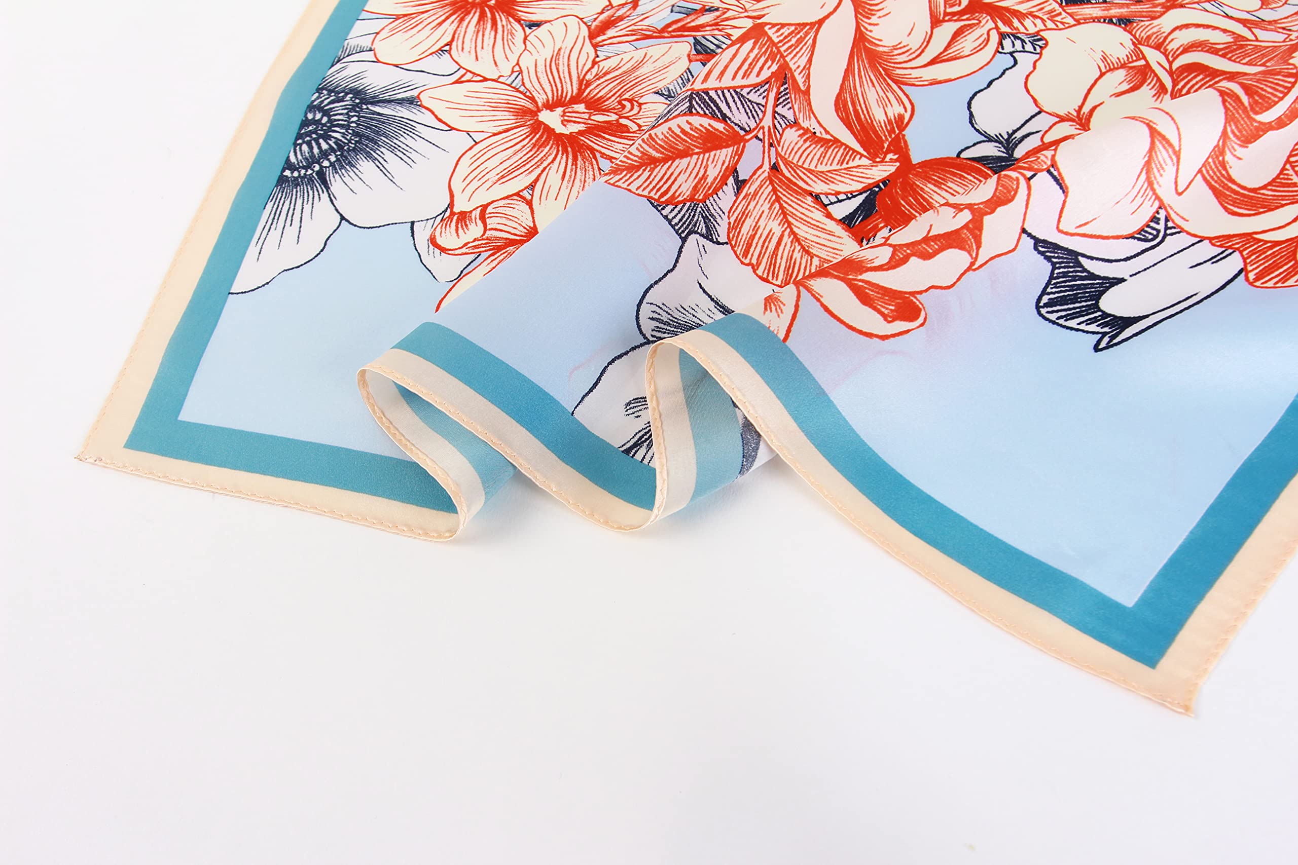 Edge detail, coral line-drawn flowers above the blue border band and cream hem