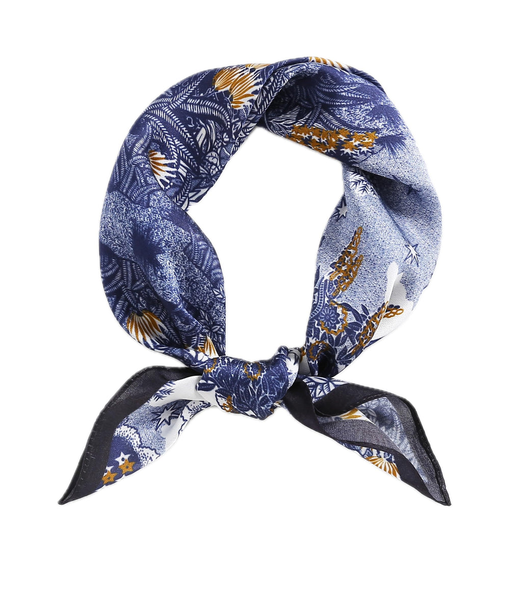 Blue toile square coiled into a loop and knotted, black-edged tails below