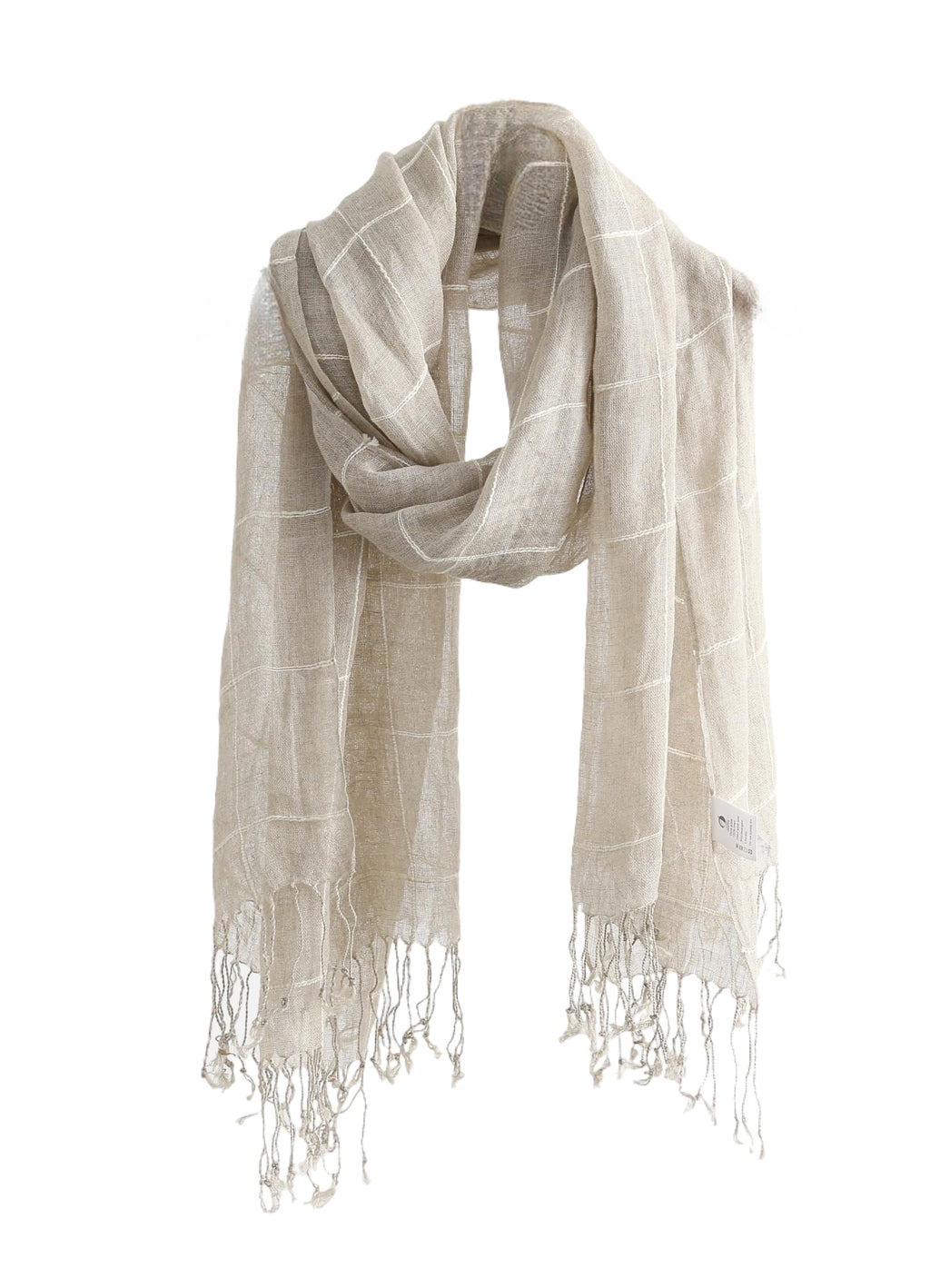 Natural beige linen scarf laid flat, white slub lines crossing the full width and length in an even windowpane check, knotted fringe along the bottom edge