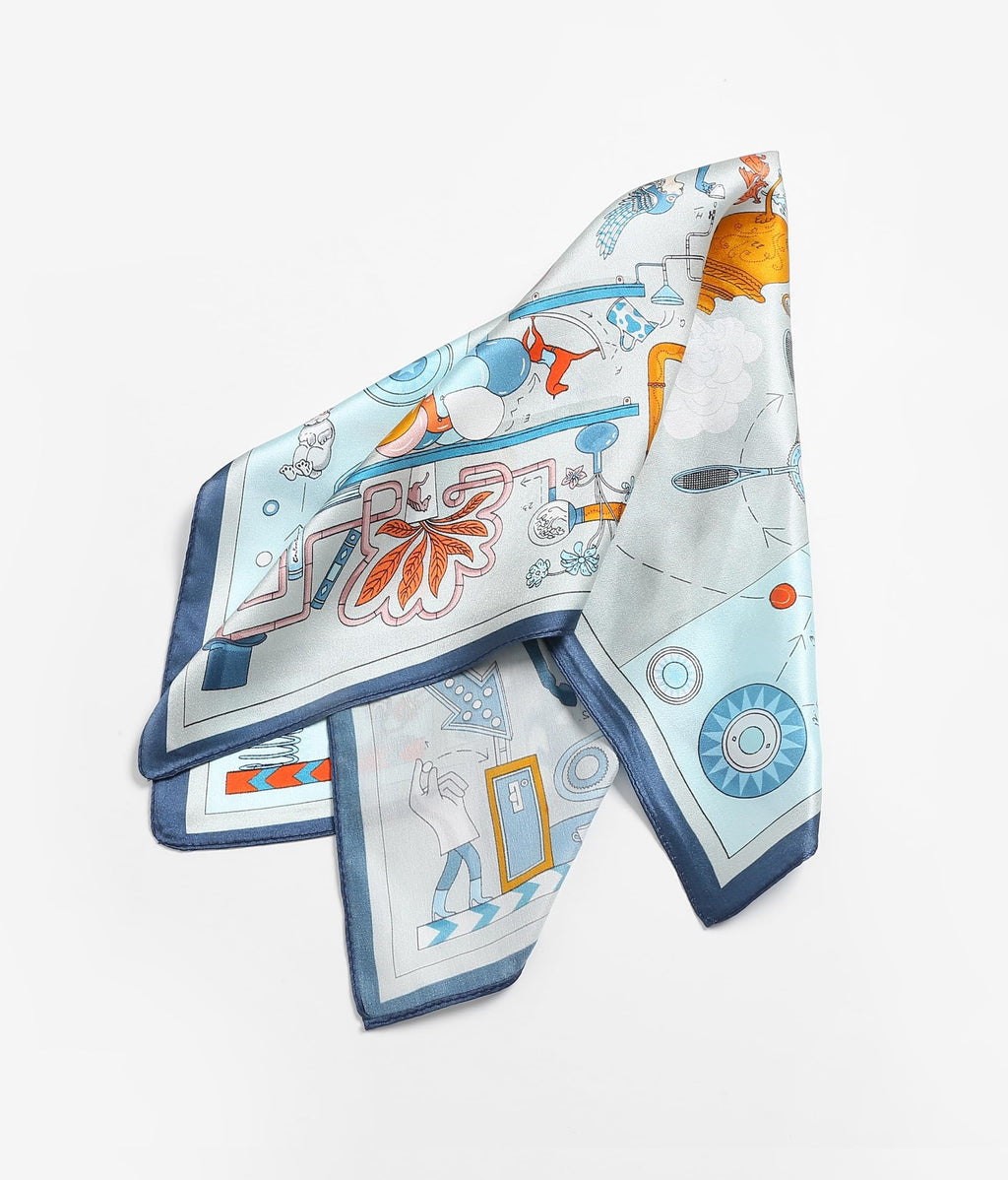 Blue illustrated square folded to a diamond, orange bloom and navy edging showing