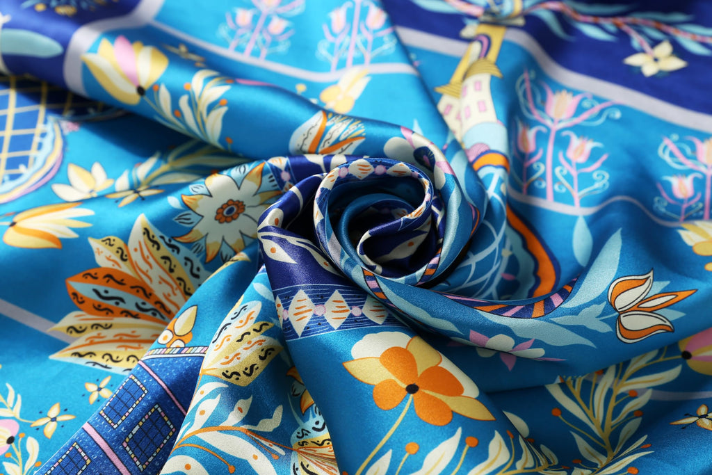 Close up of the folk art print showing coral tulips and blue lattice work