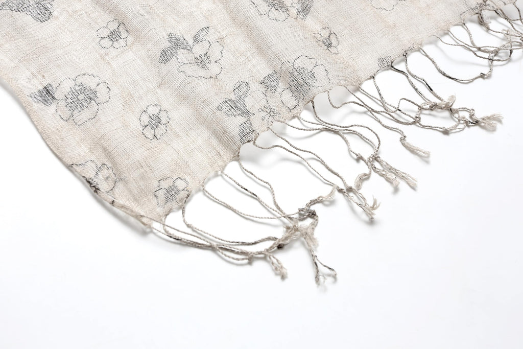 Ink floral linen scarf folded showing the print scale