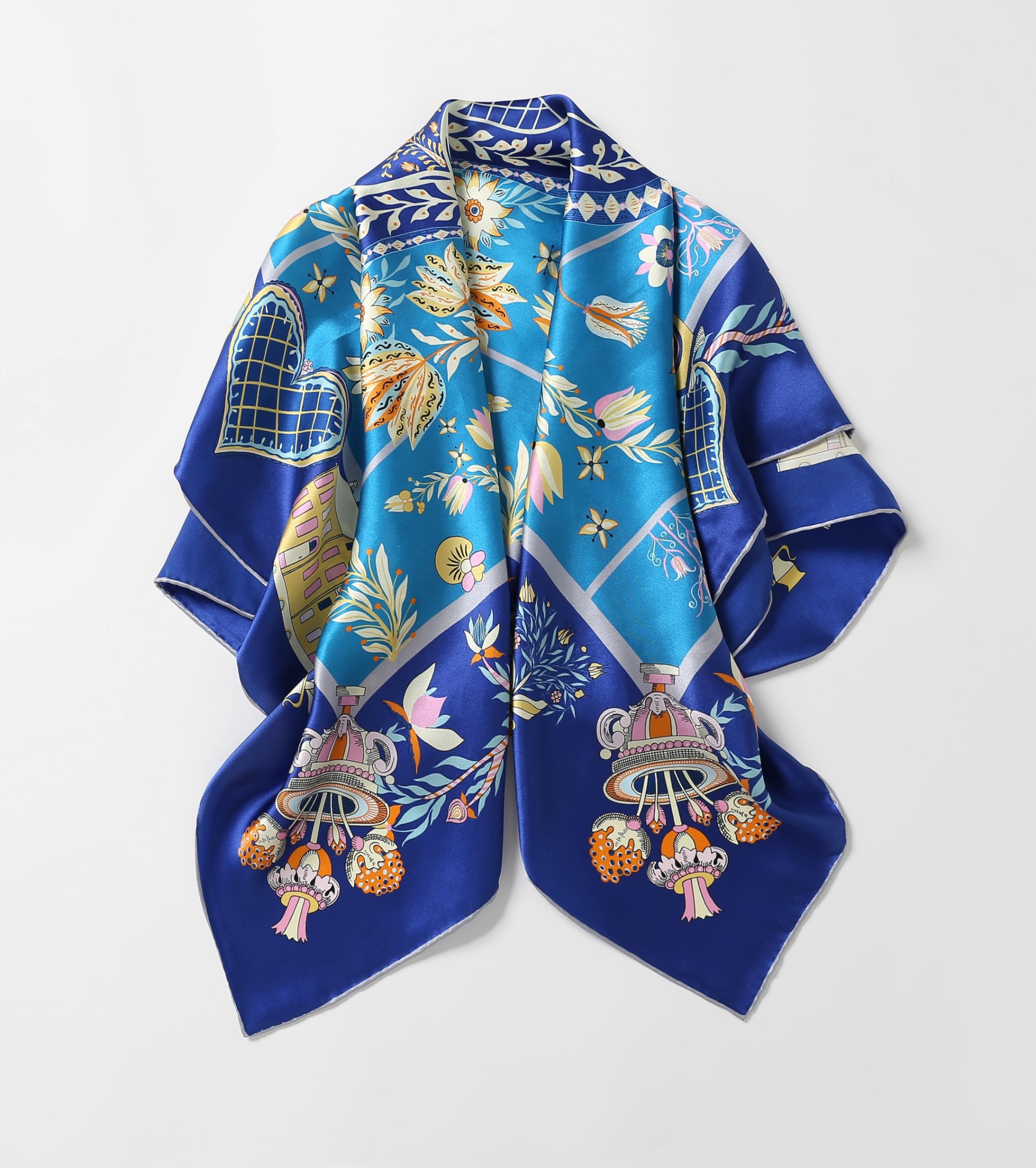 Flat angled view of the folk art silk scarf with garland hearts at the centre