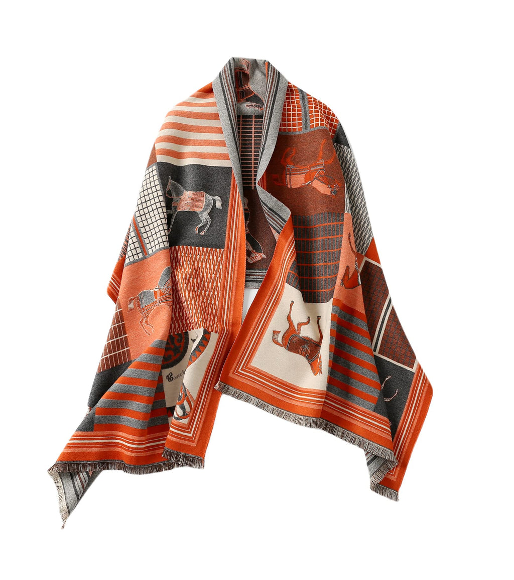 Orange and charcoal horse print shawl draped open over the shoulders showing panels of galloping horses and ribbon stripe