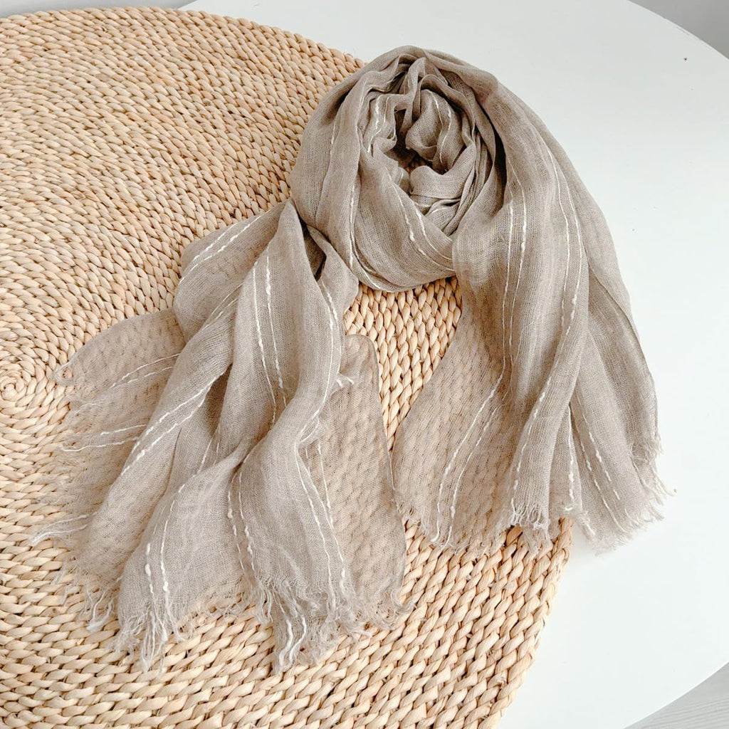 Slub stripe linen scarf folded showing the full width of the panel