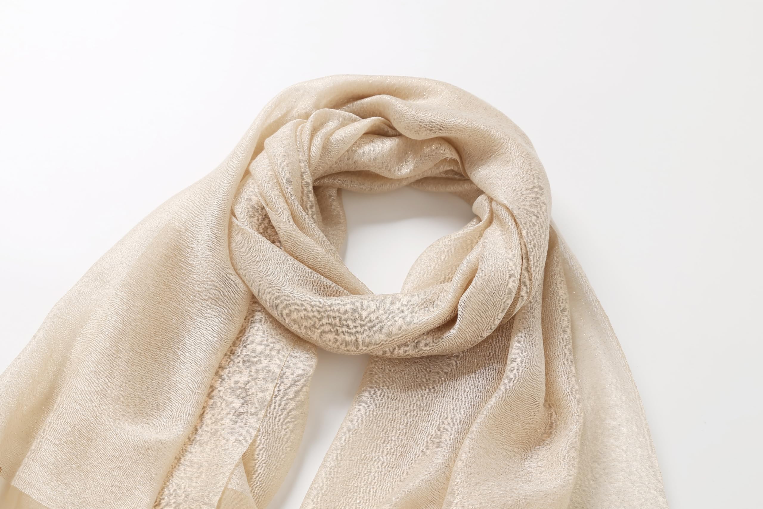 Champagne shawl coiled showing the soft drape