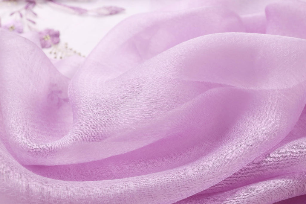 Close up of the lavender sheer fabric folds