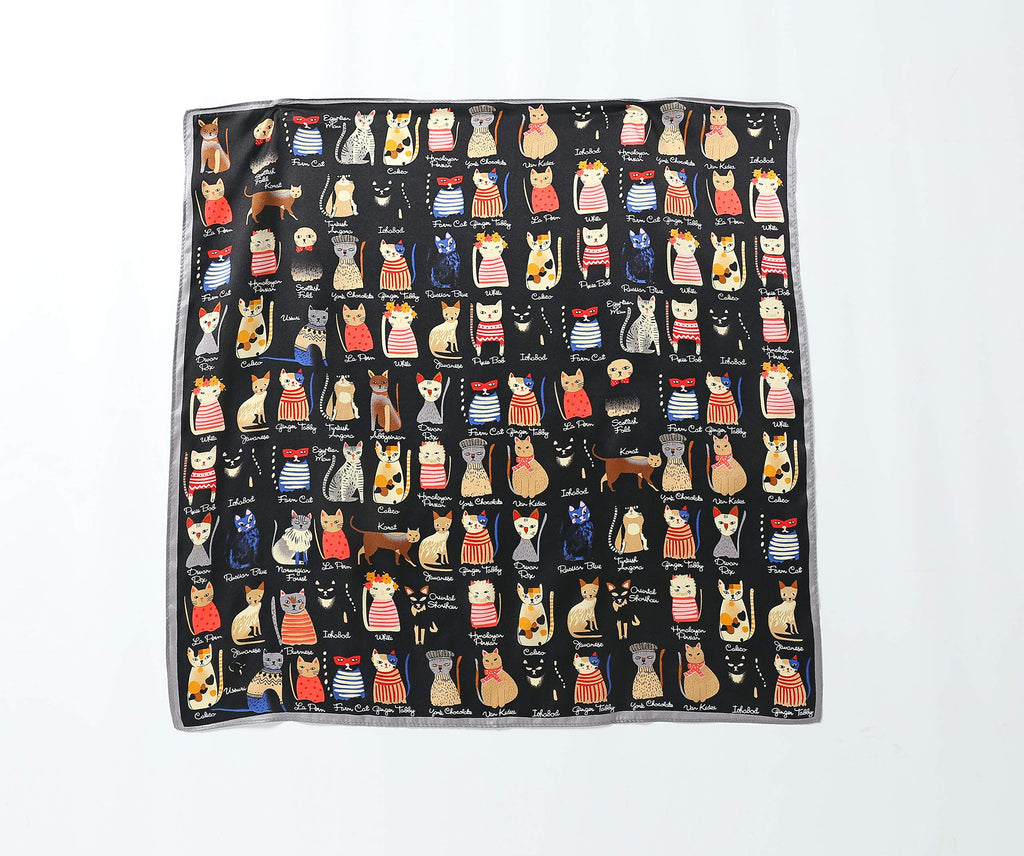 Full cat print square laid flat, many rows of cats in stripes and bows on a black ground