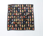 Full cat print square laid flat, many rows of cats in stripes and bows on a black ground