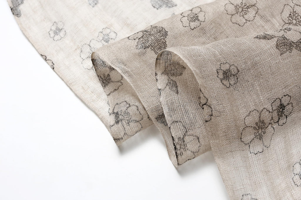Ink floral linen scarf open as a shoulder wrap
