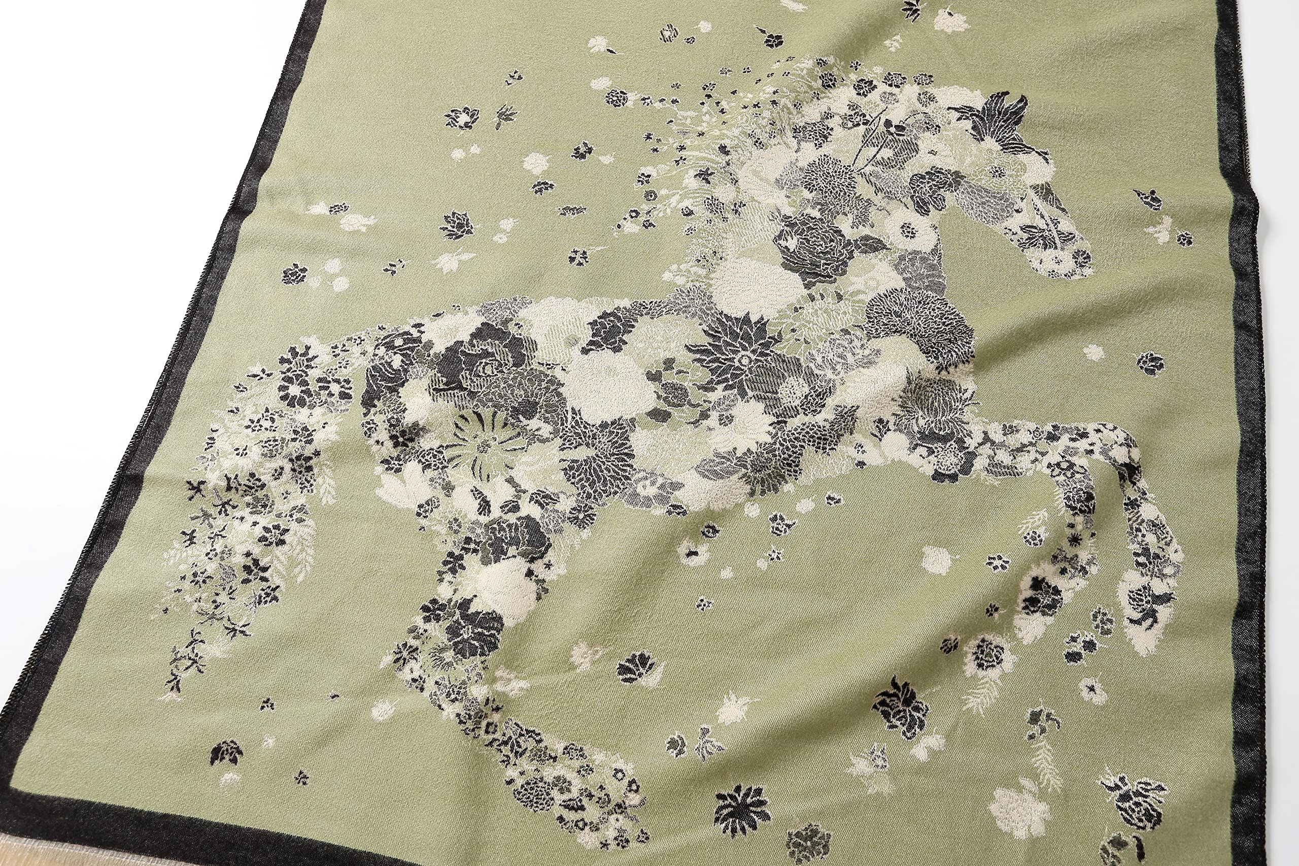 Flat detail of the floral horse motif filling the centre panel against the sage ground