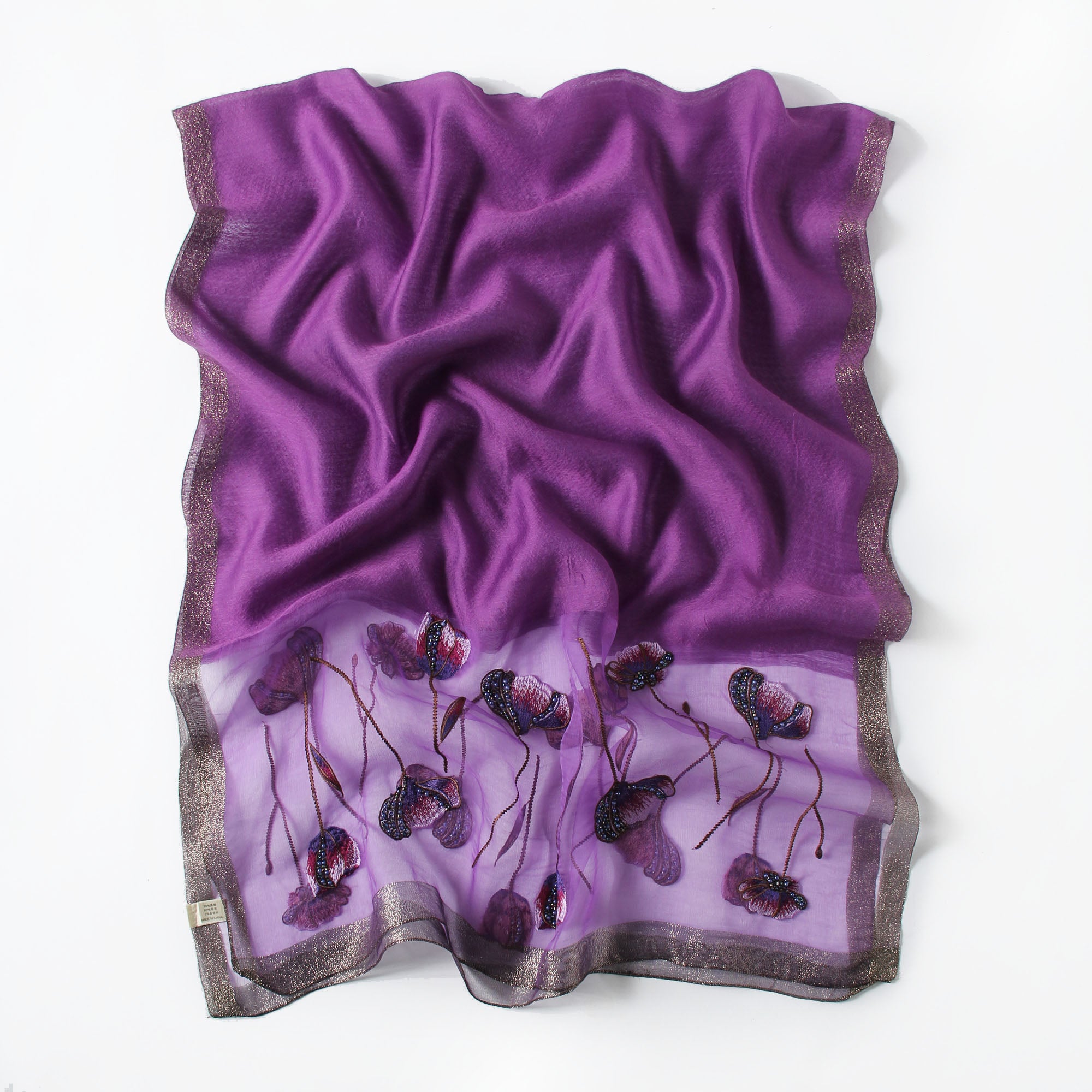 Deep purple embroidered poppy scarf with beaded centers, draped view